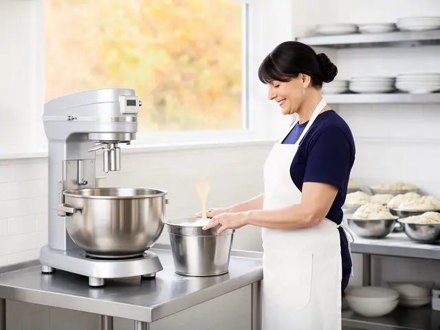 A woman with dark hair in a low bun beside new equipment in a small family diner.